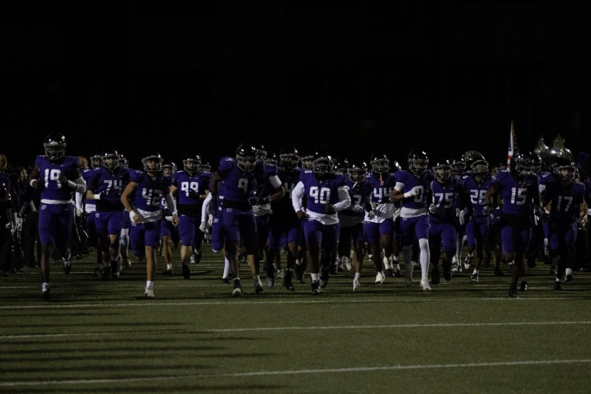 RCHS runs out to the field to get the game started against Tustin in the first round of CIF playoffs