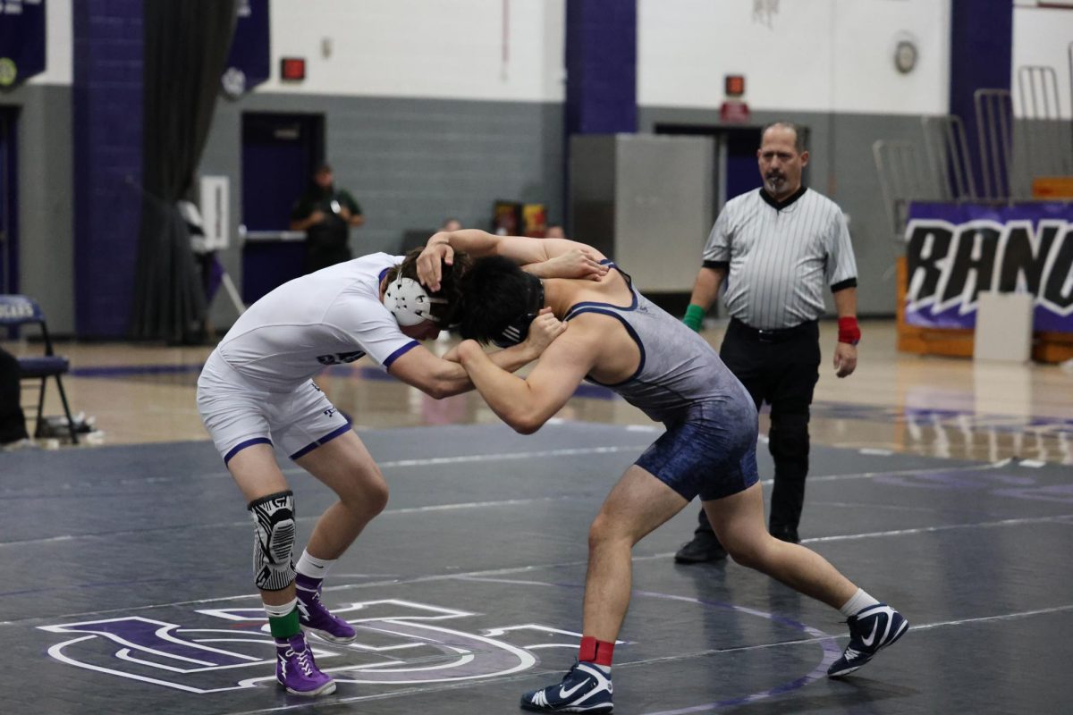 Sophomore Dominick Gates fights for control against Chino Hills.