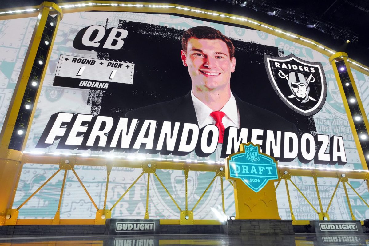 Apr 23, 2026; Pittsburgh, PA, USA; Indiana Hoosiers quarterback Fernando Mendoza is selected by the Las Vegas Raiders as the number one pick during the 2026 NFL Draft at Acrisure Stadium. Kirby Lee-Imagn Images