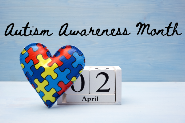 Puzzle pieces or a blue ribbon represent Autism Awareness Month in April.