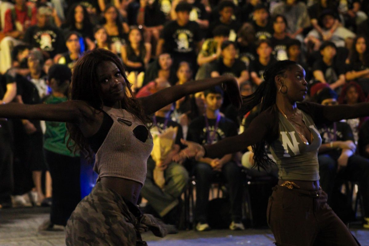 JV dancers Melodee Hall and Aeris Mitchell preform their Ren-Rally dance.